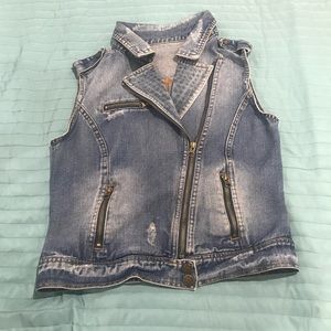Woman’s blue denim vest